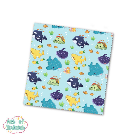 Microfiber cloth to clean glasses with a kawaii sea animals pattern like a whale shark, sting rays, garden eels and more.